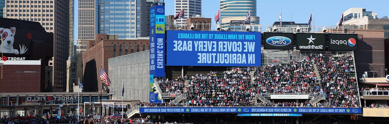Jumbotron at Minnesota Twins game featuring a CHS digital banner